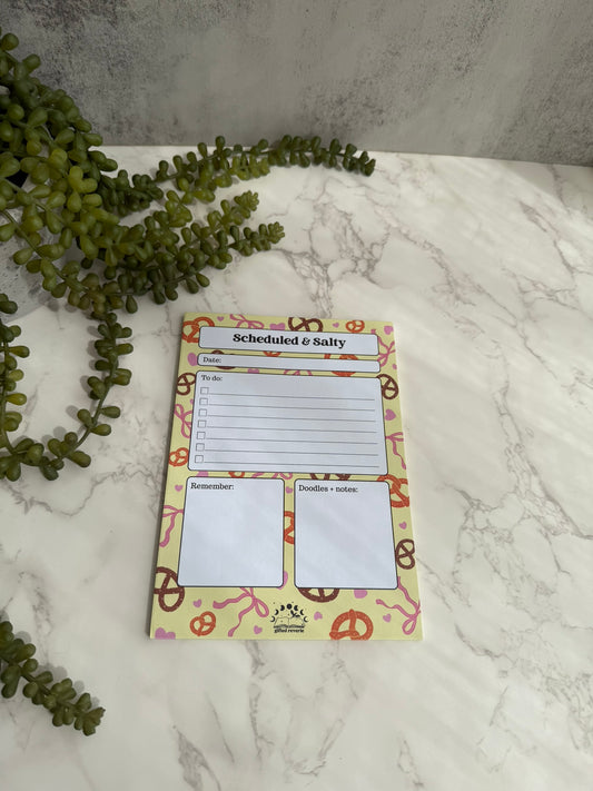 Scheduled & Salty Pretzel Notepad (A5) – A cute daily planner with personality